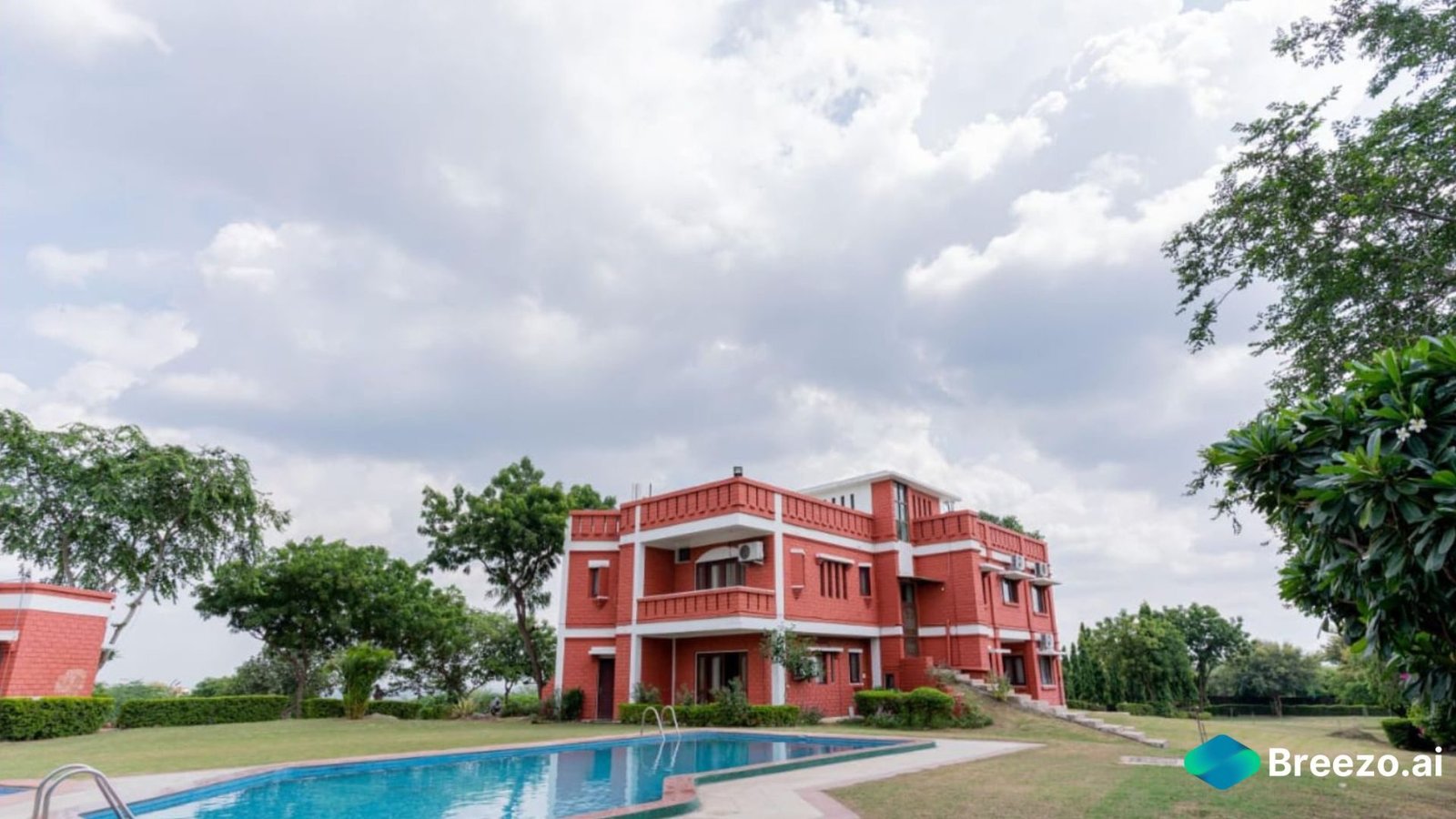 A stunning farmhouse for film shoots in Delhi NCR, Gurgaon, and Noida with lush lawns and a grand hall.